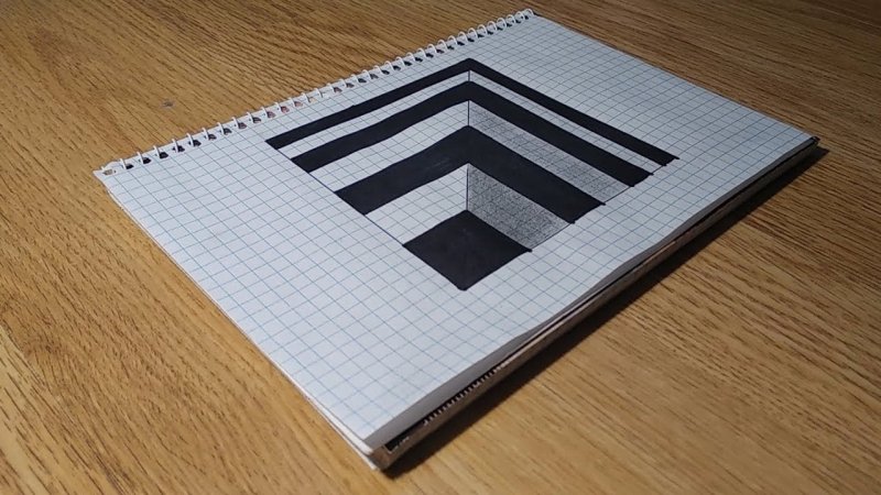 Иллюзия на бумаге в клетку